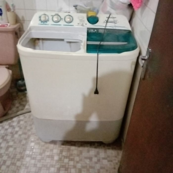 Service mesin cuci Sharp Aquamagic ES-T95CL masalah Mesin cuci tidak berputar sebagaimana mestinya(pelan), dan pengering tidak berputar sama sekali.