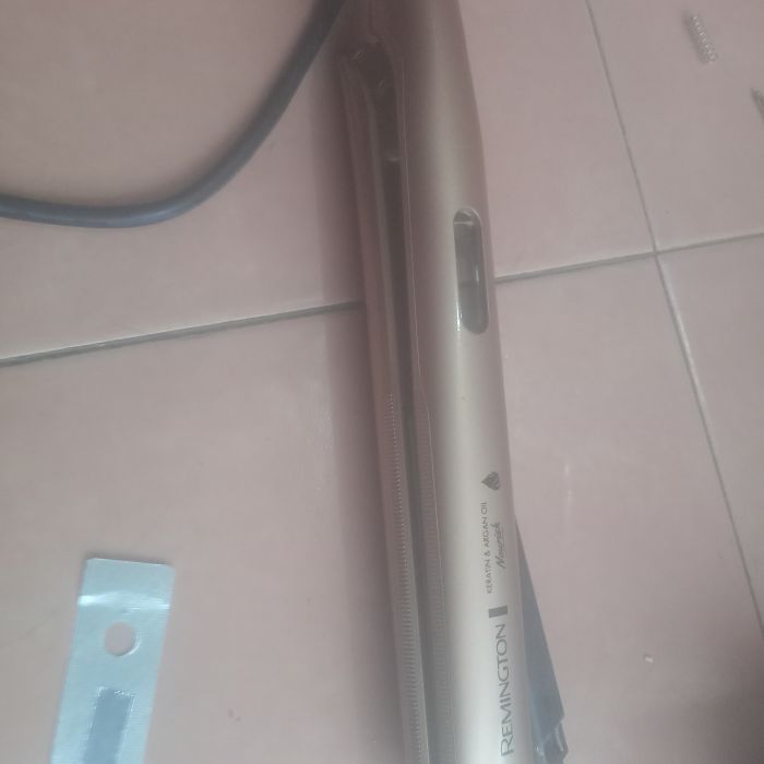 Service catokan Remington Keratin masalah Tombol power rusak