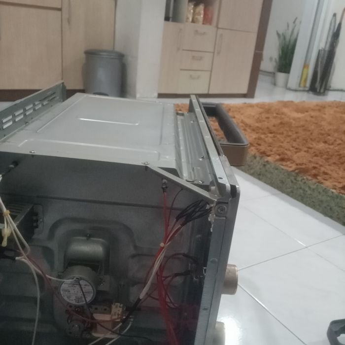 Service oven TRURICH Seri dengan Kapasitas 60L masalah Oven listrik (merk TRURICH, 60L) tombol timer yang sekaligus berfungsi sebagai on off nya tidak berfungsi, sehingga terus menyala